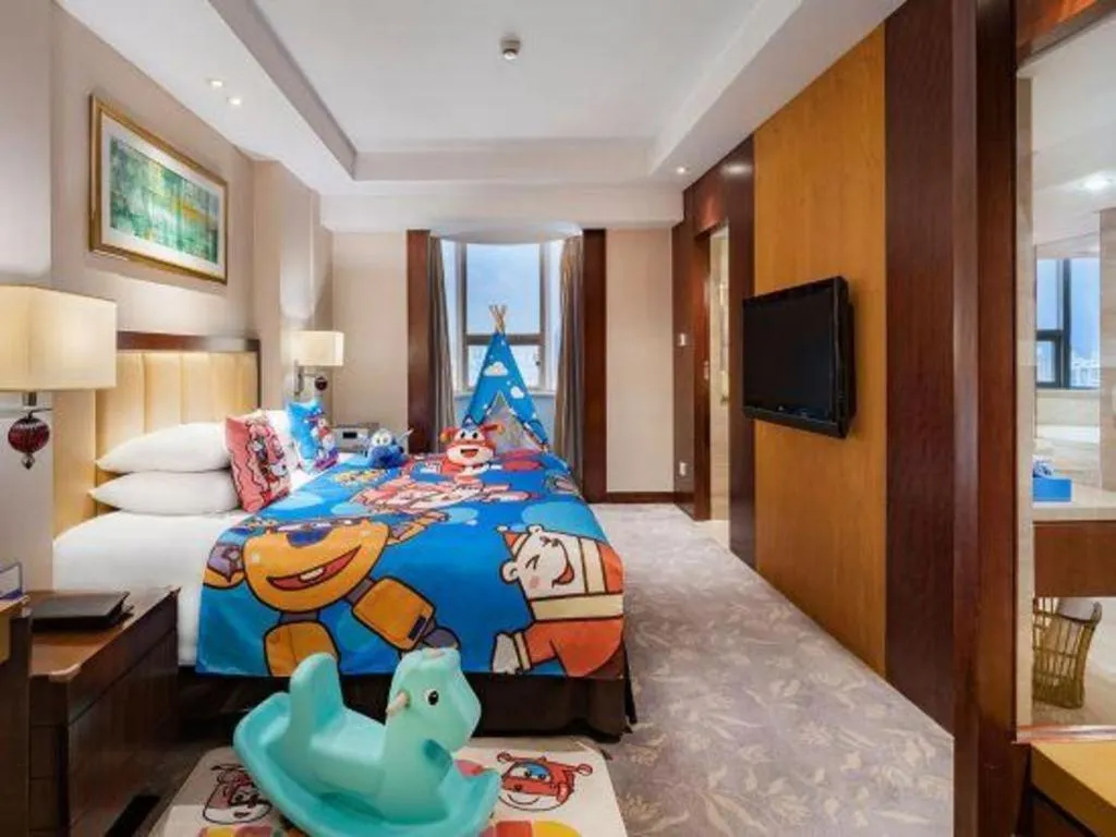 Bed in New Century Shaoxing Grand Hotel