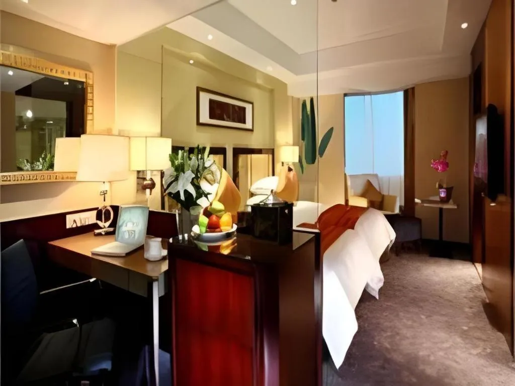 Bed in New Century Shaoxing Grand Hotel