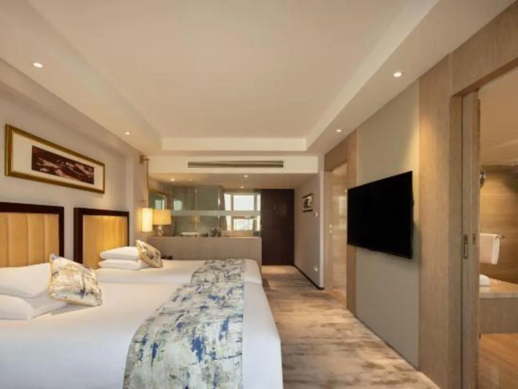 Bed in New Century Shaoxing Grand Hotel