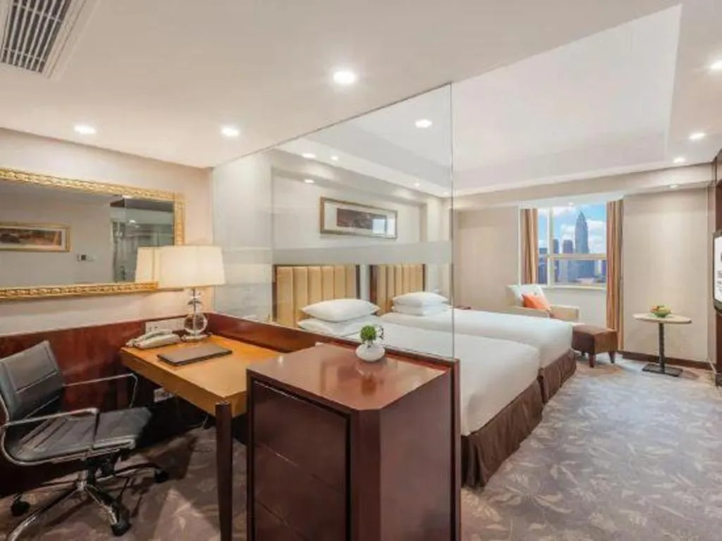 Bed in New Century Shaoxing Grand Hotel