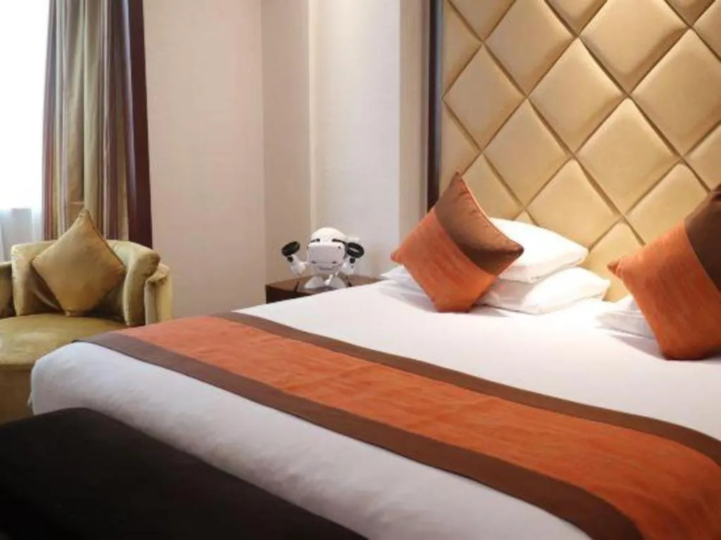 Bed in New Century Shaoxing Grand Hotel