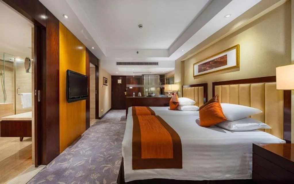 Bed in New Century Shaoxing Grand Hotel