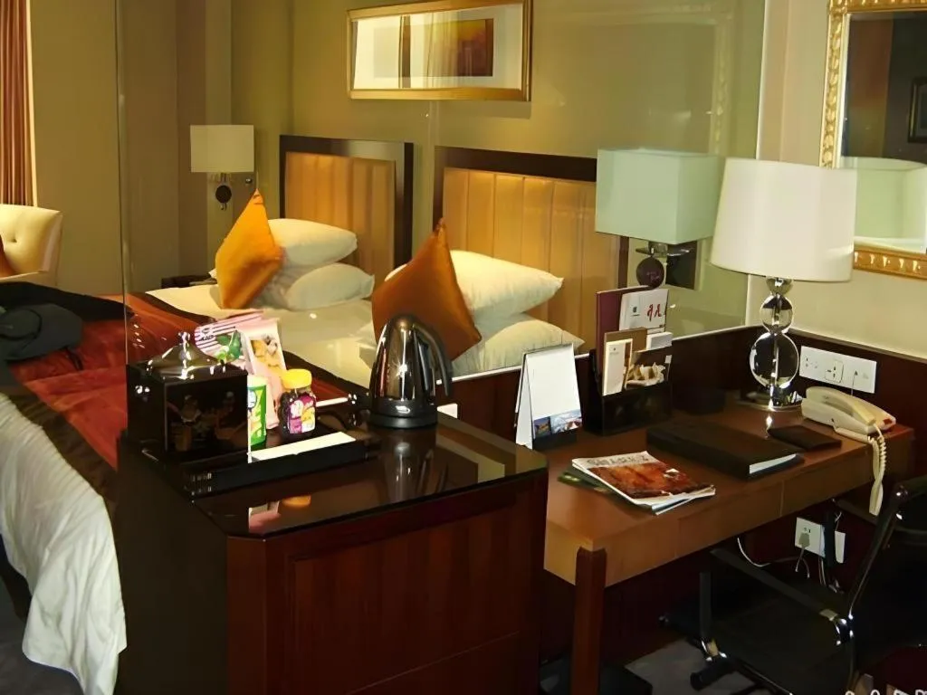 Bed in New Century Shaoxing Grand Hotel