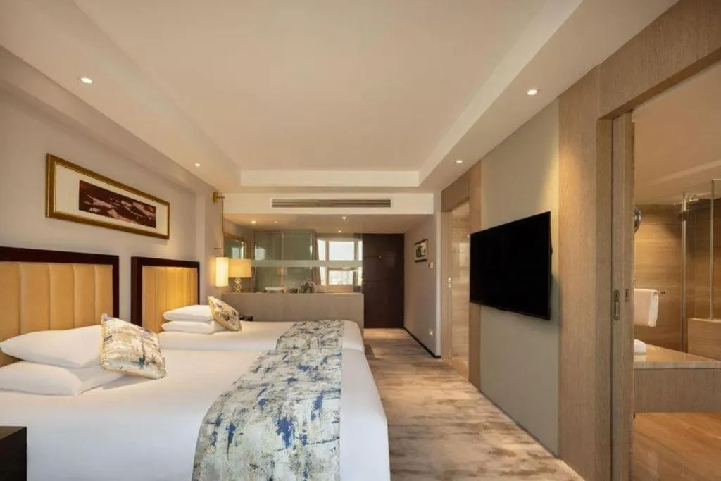 Bed in New Century Shaoxing Grand Hotel