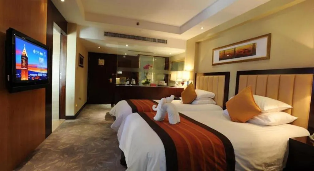 Bed in New Century Shaoxing Grand Hotel