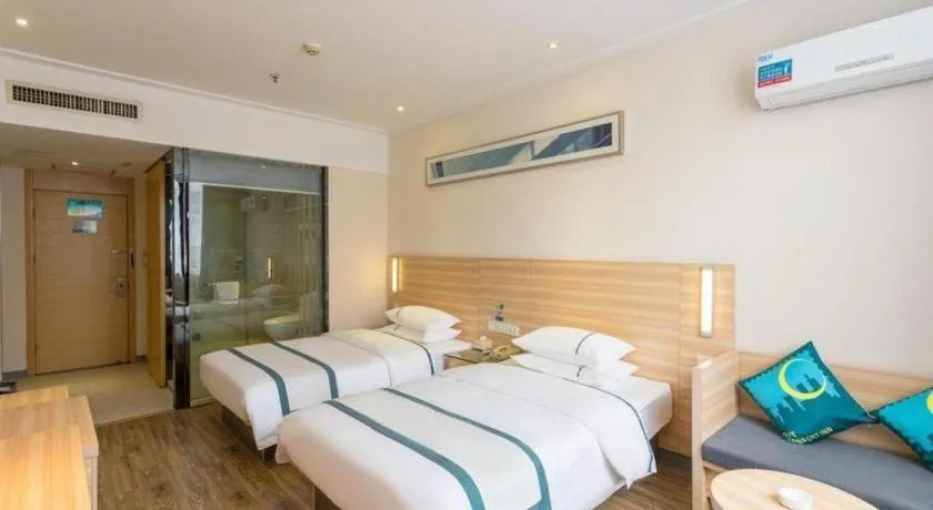 Bed in City Comfort Inn Ezhou Wenxing Avenue Central Hospital