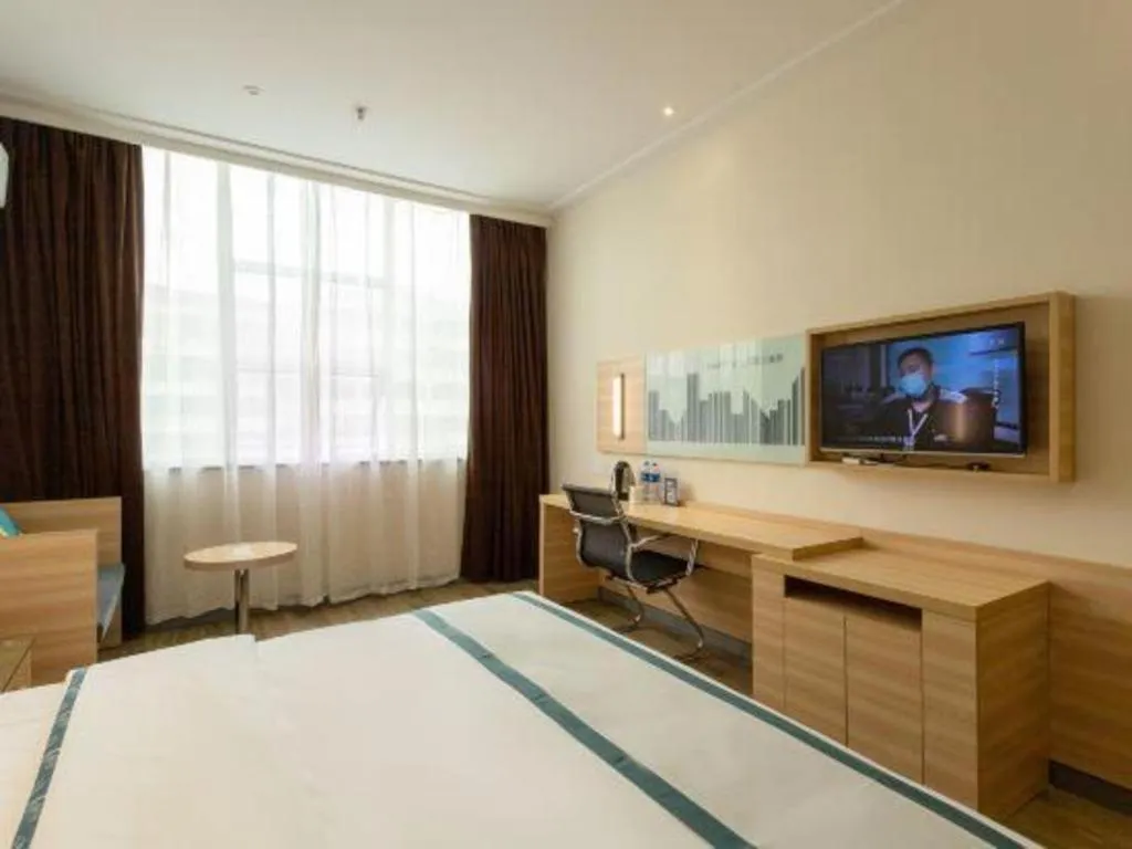 Bed in City Comfort Inn Ezhou Wenxing Avenue Central Hospital