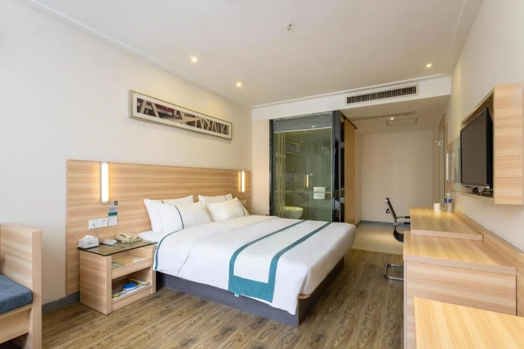 Bed in City Comfort Inn Ezhou Wenxing Avenue Central Hospital