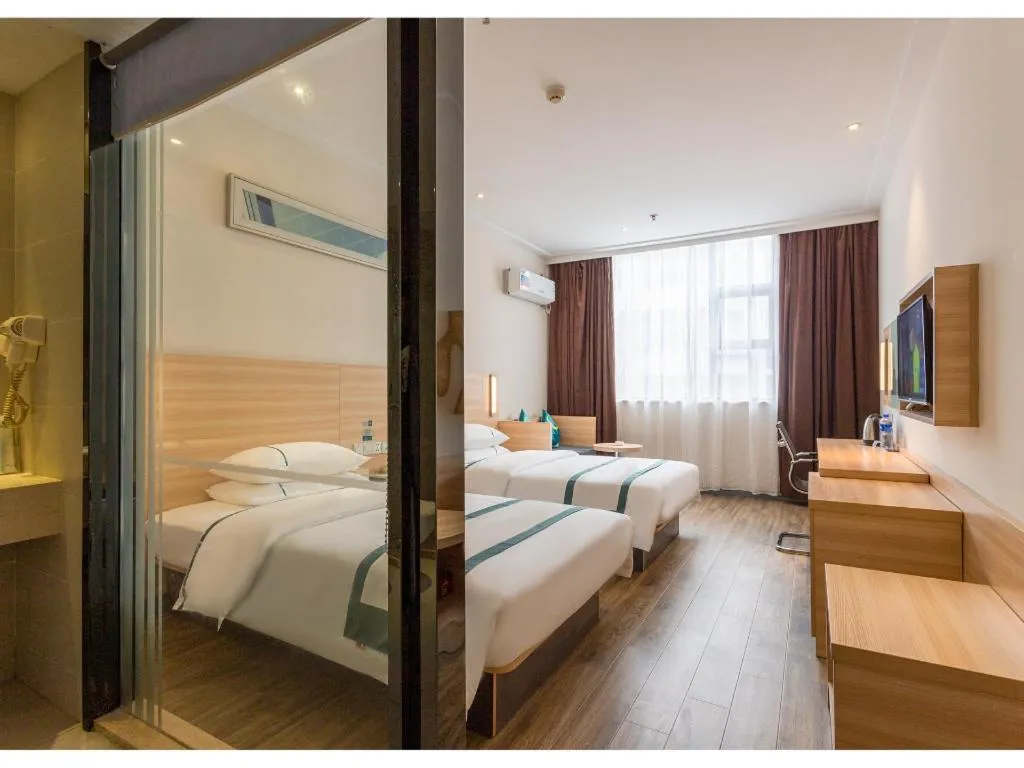 Bed in City Comfort Inn Ezhou Wenxing Avenue Central Hospital