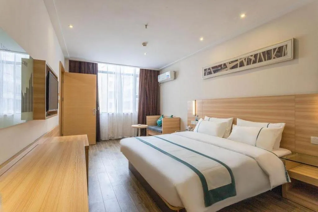 Bed in City Comfort Inn Ezhou Wenxing Avenue Central Hospital