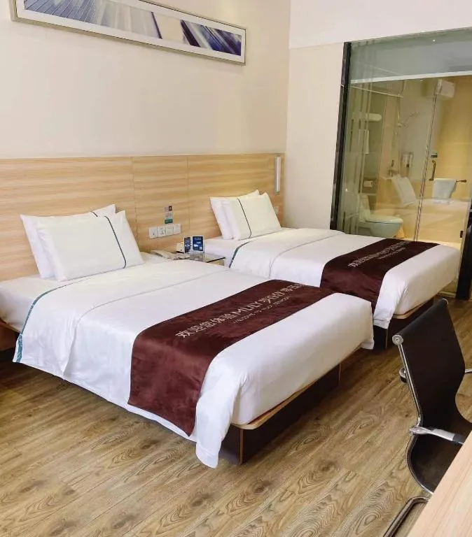 Bed in City Comfort Inn Ezhou Wenxing Avenue Central Hospital