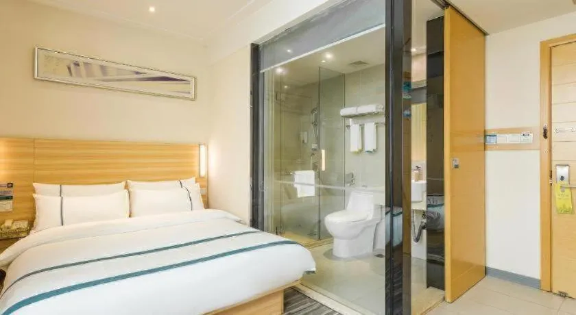 Bed in City Comfort Inn Ezhou Wenxing Avenue Central Hospital