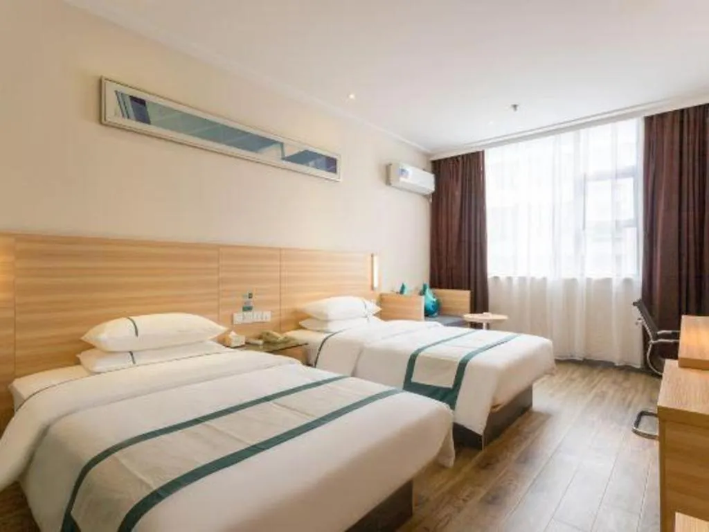 Bed in City Comfort Inn Ezhou Wenxing Avenue Central Hospital