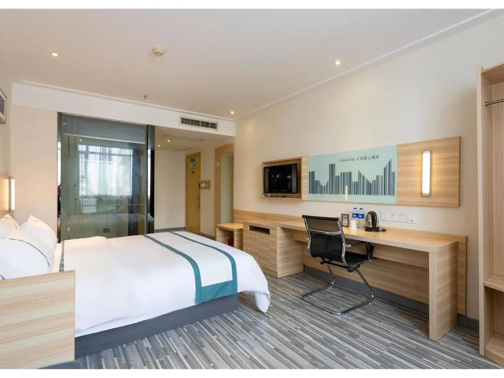 Bed in City Comfort Inn Ezhou Wenxing Avenue Central Hospital