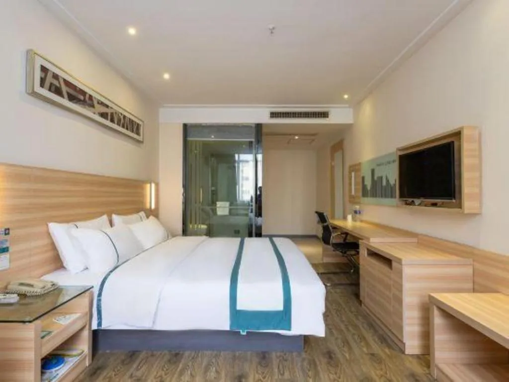 Bed in City Comfort Inn Ezhou Wenxing Avenue Central Hospital