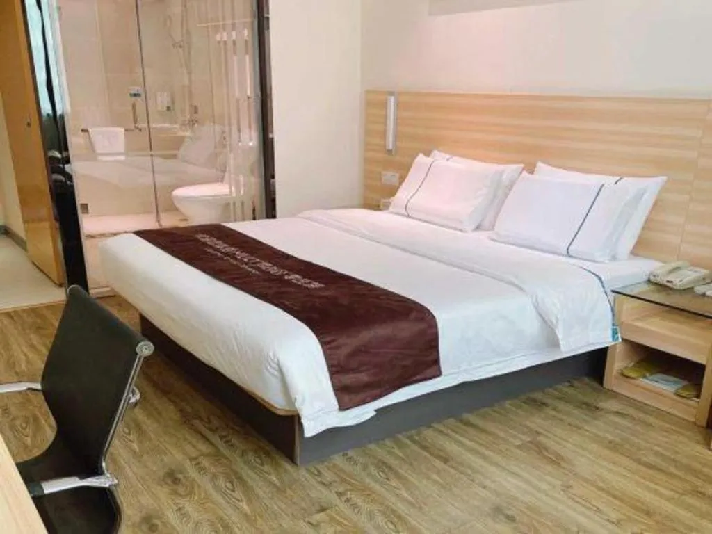 Bed in City Comfort Inn Ezhou Wenxing Avenue Central Hospital