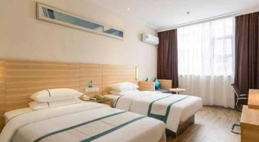 Bed in City Comfort Inn Ezhou Wenxing Avenue Central Hospital