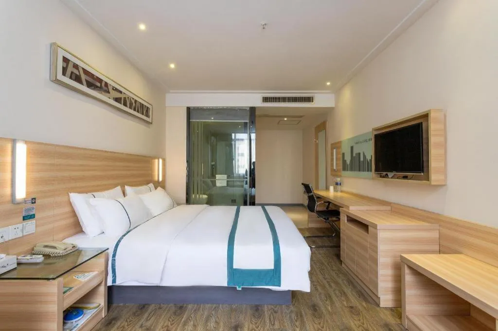 Bed in City Comfort Inn Ezhou Wenxing Avenue Central Hospital
