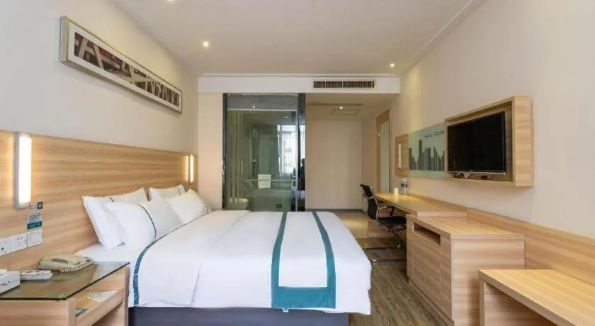 Bed in City Comfort Inn Ezhou Wenxing Avenue Central Hospital
