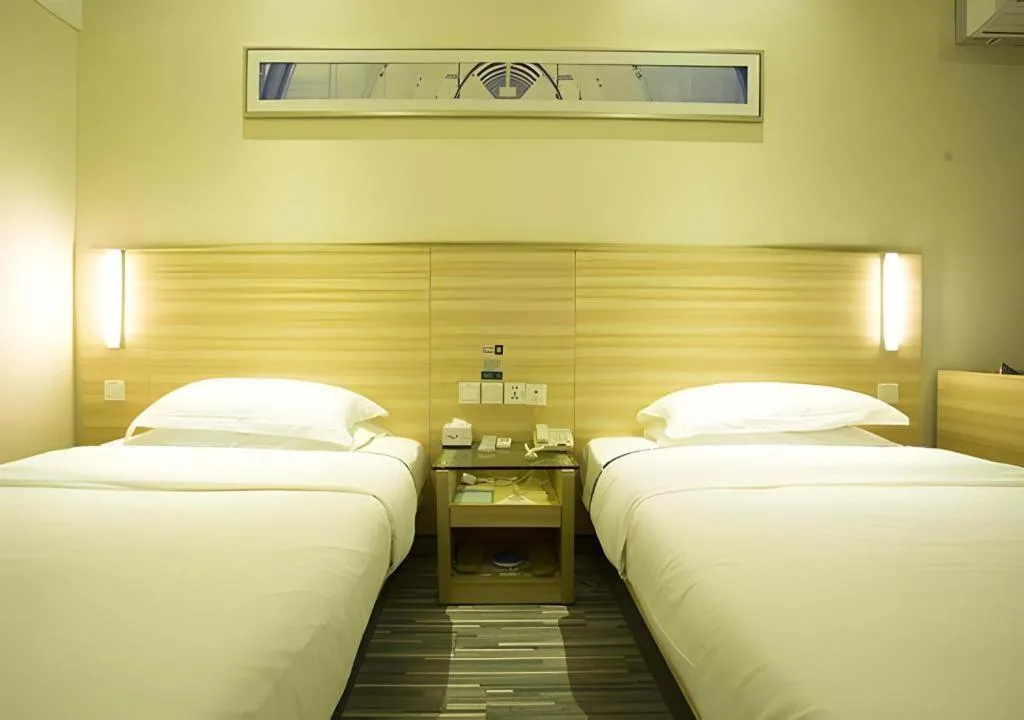Bed in City Comfort Inn Ezhou Wenxing Avenue Central Hospital