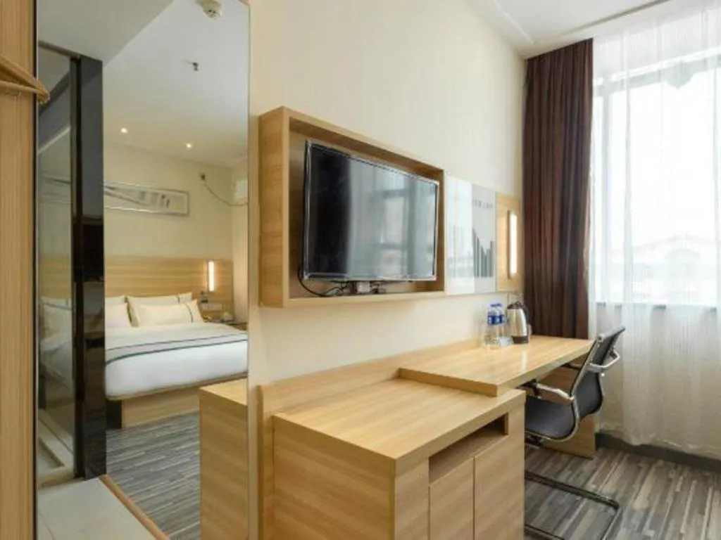 Bed in City Comfort Inn Ezhou Wenxing Avenue Central Hospital