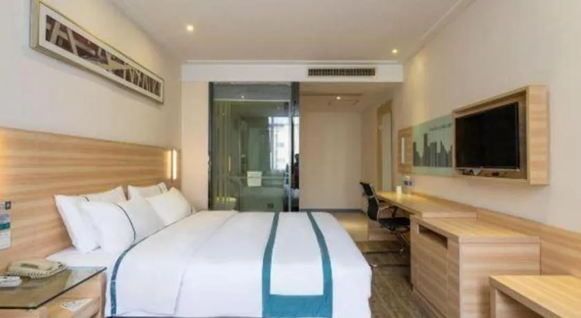 Bed in City Comfort Inn Ezhou Wenxing Avenue Central Hospital