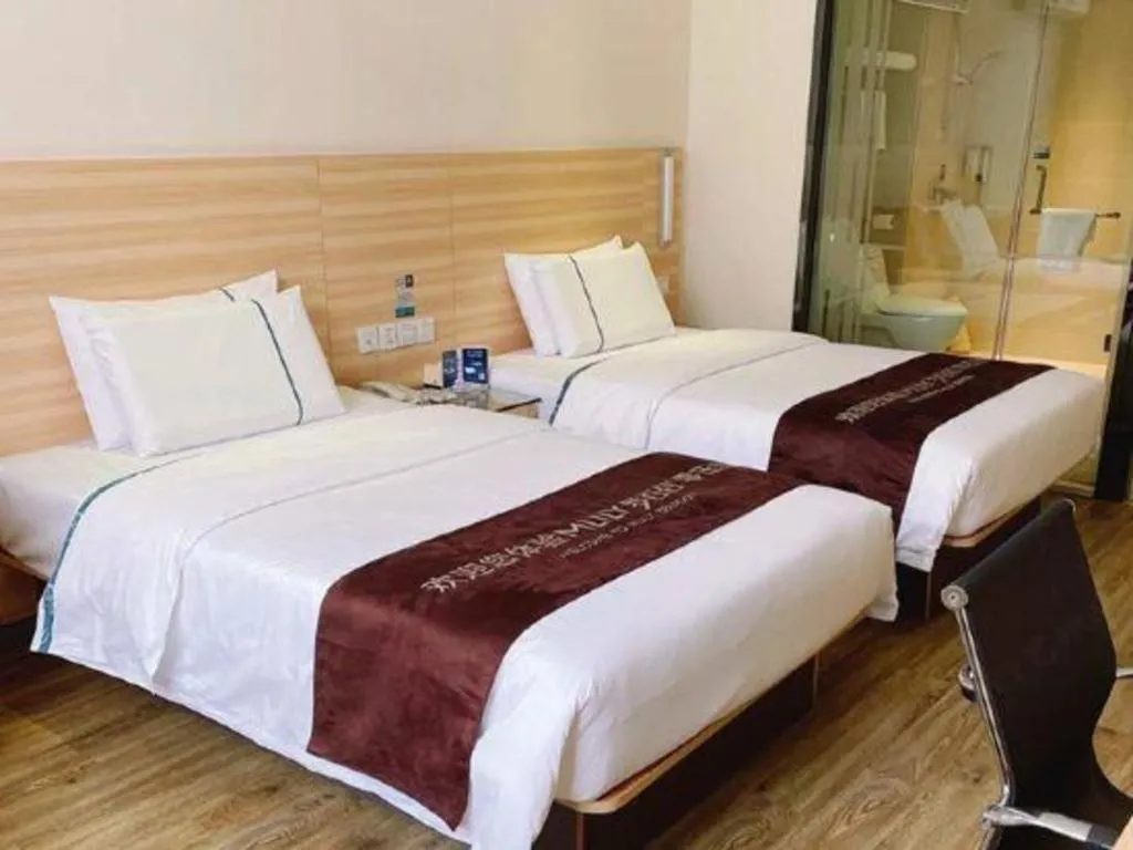 Bed in City Comfort Inn Ezhou Wenxing Avenue Central Hospital