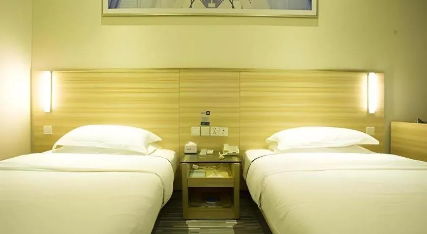 Bed in City Comfort Inn Ezhou Wenxing Avenue Central Hospital