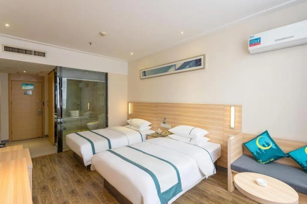 Bed in City Comfort Inn Ezhou Wenxing Avenue Central Hospital