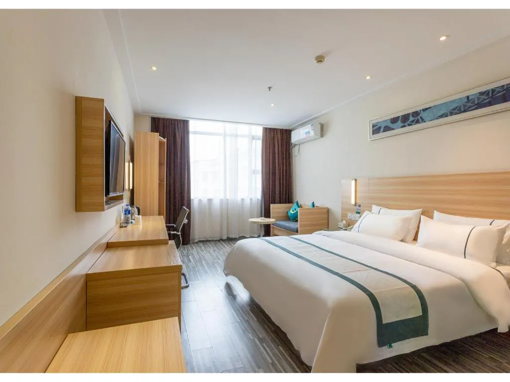 Bed in City Comfort Inn Ezhou Wenxing Avenue Central Hospital