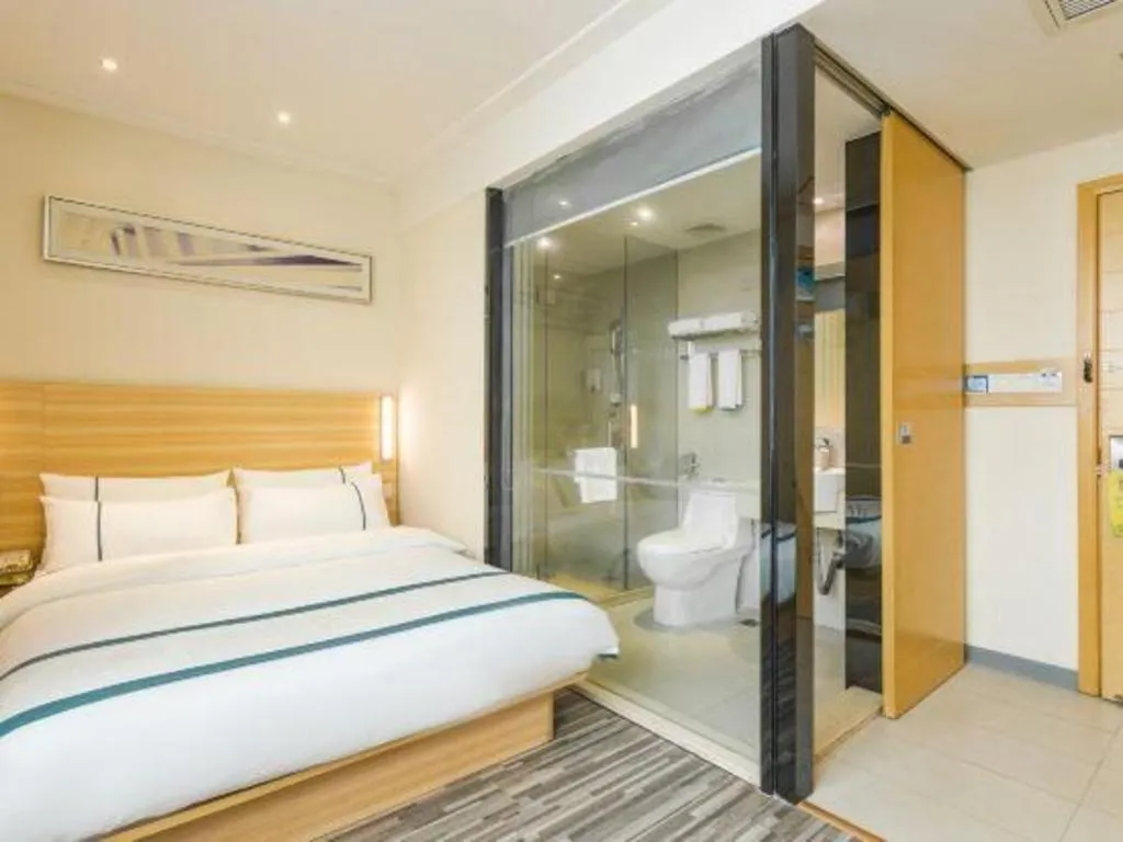 Bed in City Comfort Inn Ezhou Wenxing Avenue Central Hospital