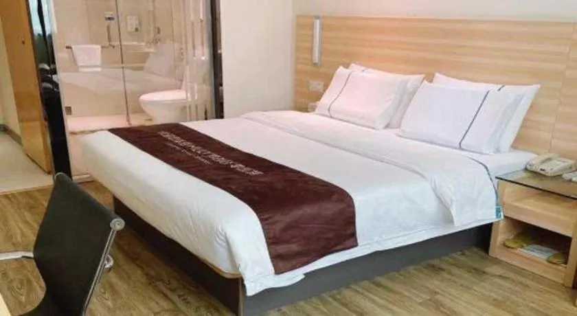 Bed in City Comfort Inn Ezhou Wenxing Avenue Central Hospital