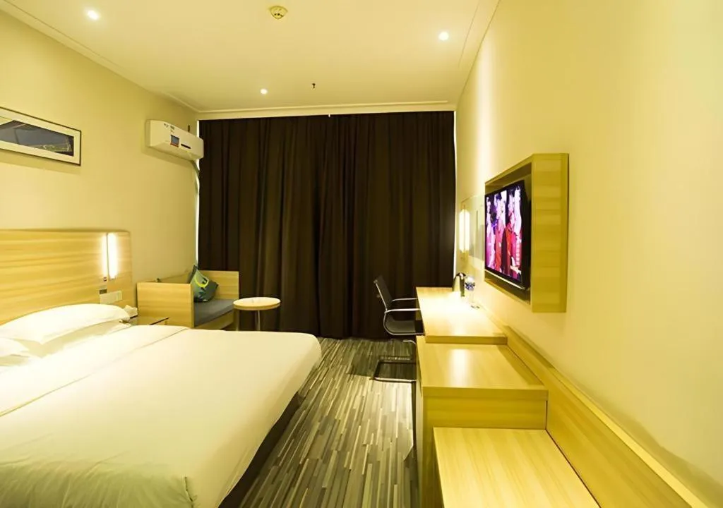 Bed in City Comfort Inn Ezhou Wenxing Avenue Central Hospital