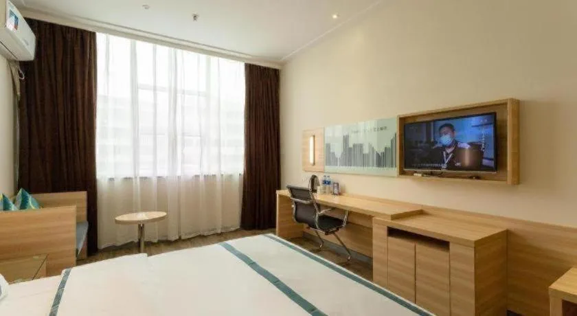 Bed in City Comfort Inn Ezhou Wenxing Avenue Central Hospital