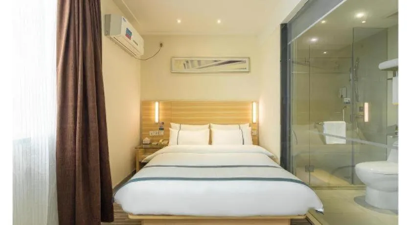 Bed in City Comfort Inn Ezhou Wenxing Avenue Central Hospital