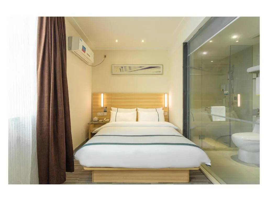 Bed in City Comfort Inn Ezhou Wenxing Avenue Central Hospital