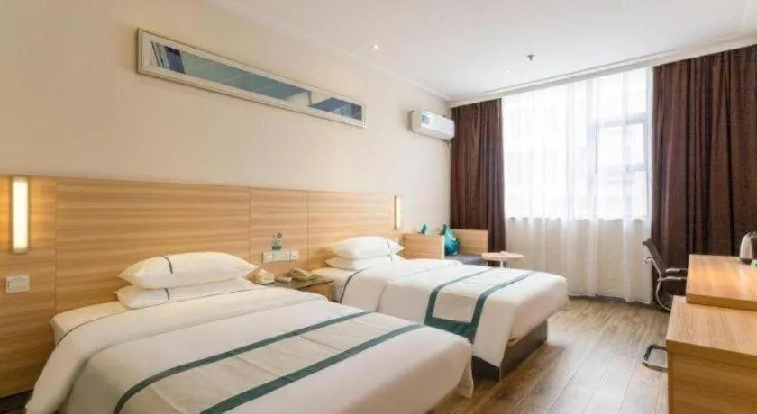 Bed in City Comfort Inn Ezhou Wenxing Avenue Central Hospital