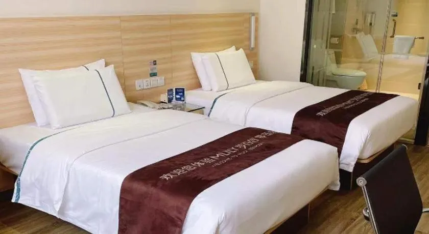 Bed in City Comfort Inn Ezhou Wenxing Avenue Central Hospital