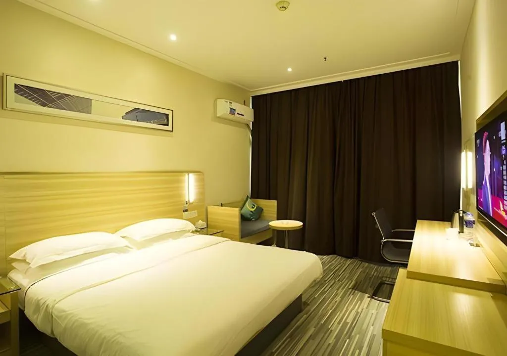 Bed in City Comfort Inn Ezhou Wenxing Avenue Central Hospital