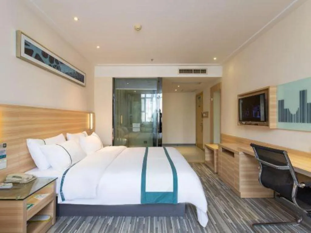 Bed in City Comfort Inn Ezhou Wenxing Avenue Central Hospital