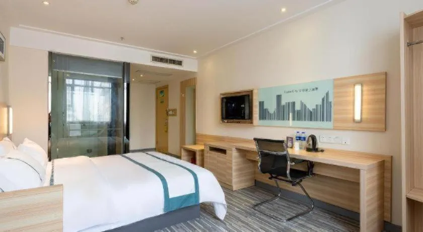 Bed in City Comfort Inn Ezhou Wenxing Avenue Central Hospital