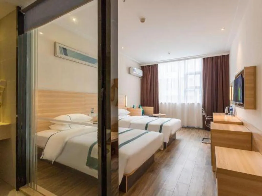 Bed in City Comfort Inn Ezhou Wenxing Avenue Central Hospital