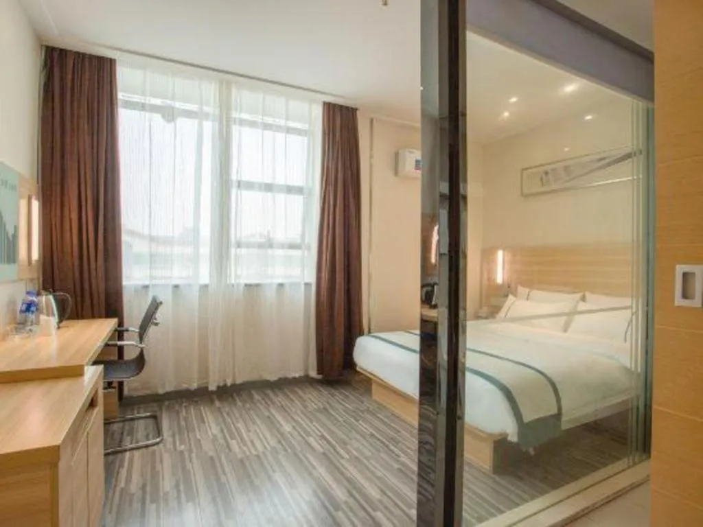 Bed in City Comfort Inn Ezhou Wenxing Avenue Central Hospital