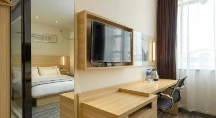Bed in City Comfort Inn Ezhou Wenxing Avenue Central Hospital