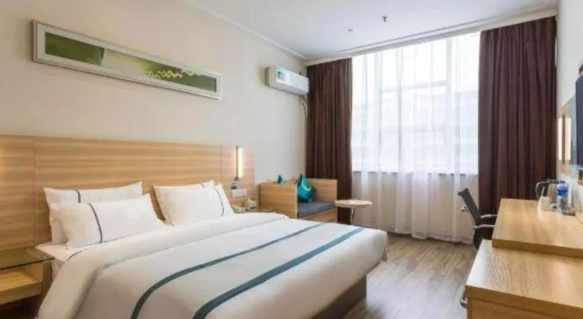 Bed in City Comfort Inn Ezhou Wenxing Avenue Central Hospital