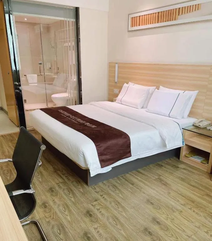Bed in City Comfort Inn Ezhou Wenxing Avenue Central Hospital