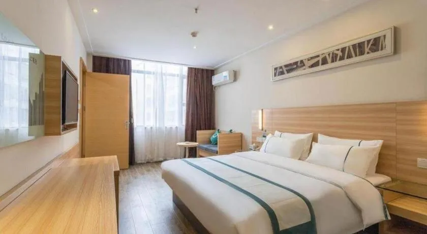Bed in City Comfort Inn Ezhou Wenxing Avenue Central Hospital