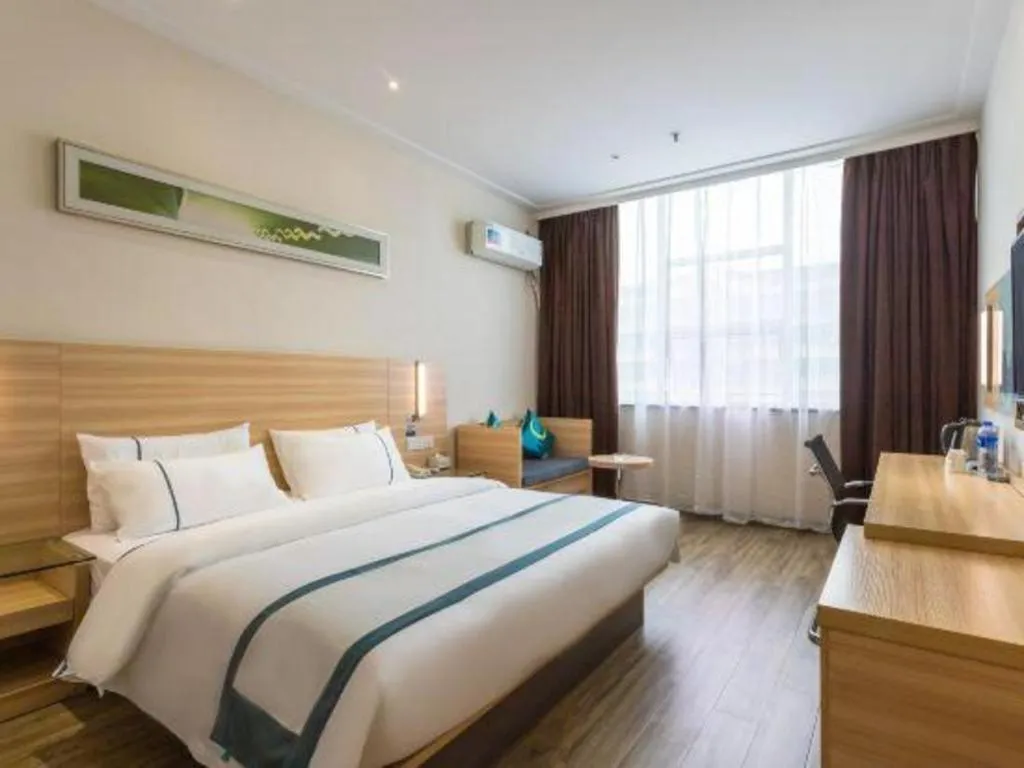 Bed in City Comfort Inn Ezhou Wenxing Avenue Central Hospital