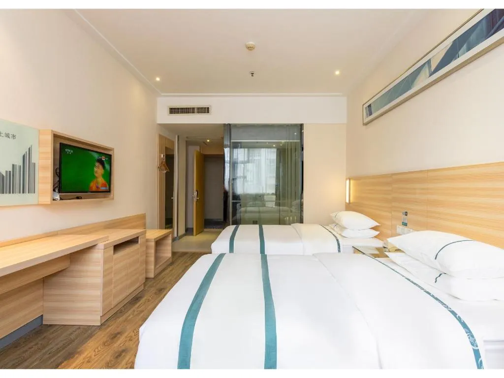 Bed in City Comfort Inn Ezhou Wenxing Avenue Central Hospital