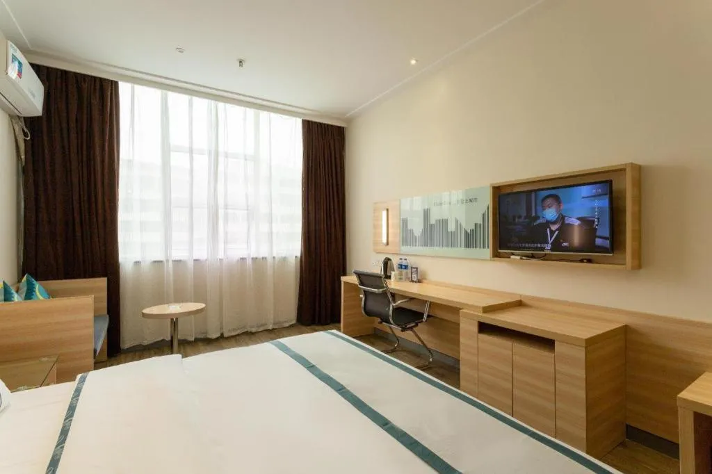 Bed in City Comfort Inn Ezhou Wenxing Avenue Central Hospital